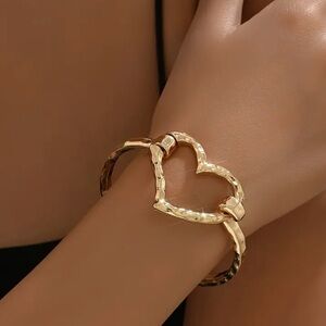 Gold Hammered Heart-Shaped Bracelet with Coiled Design